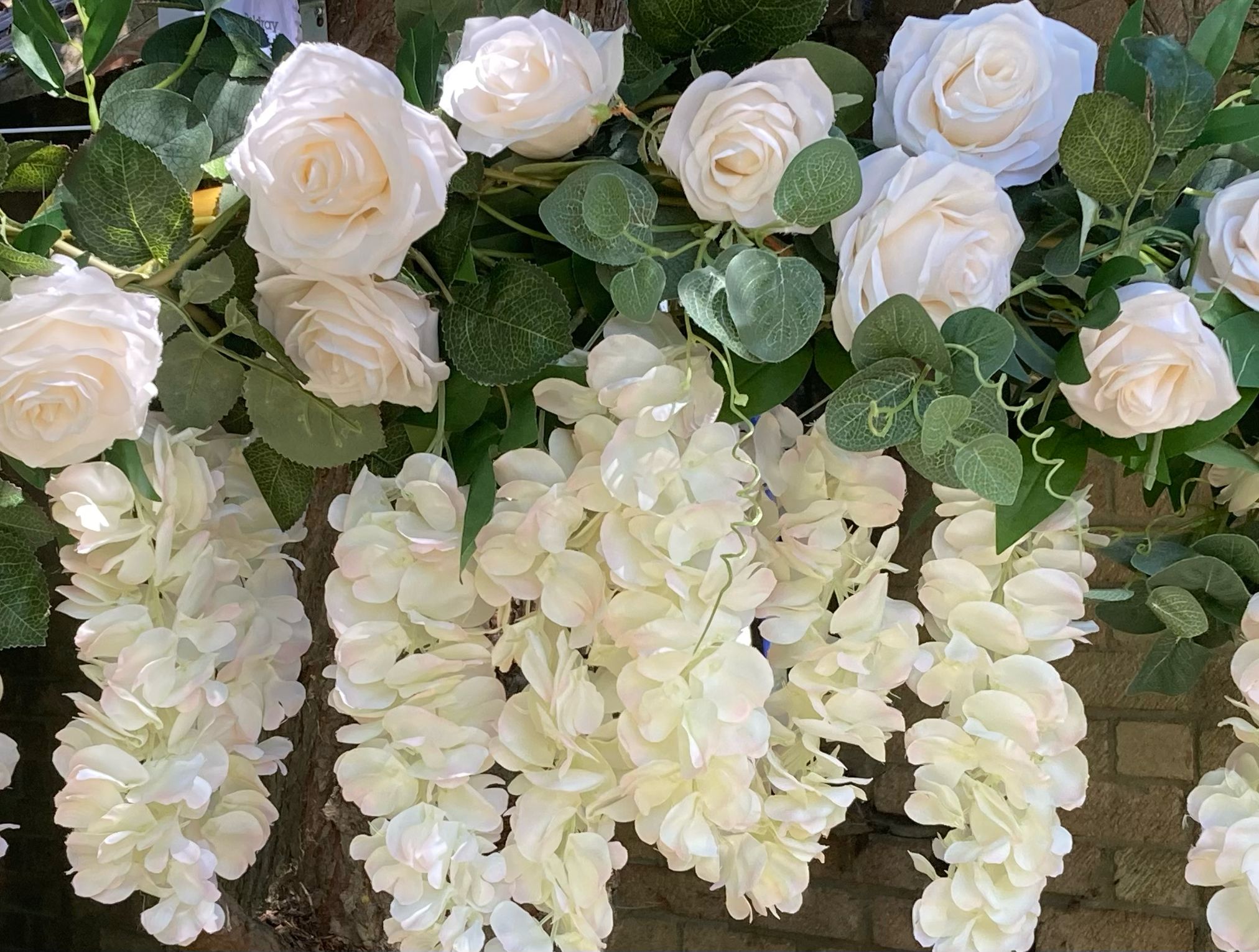 White roses and flower garlands