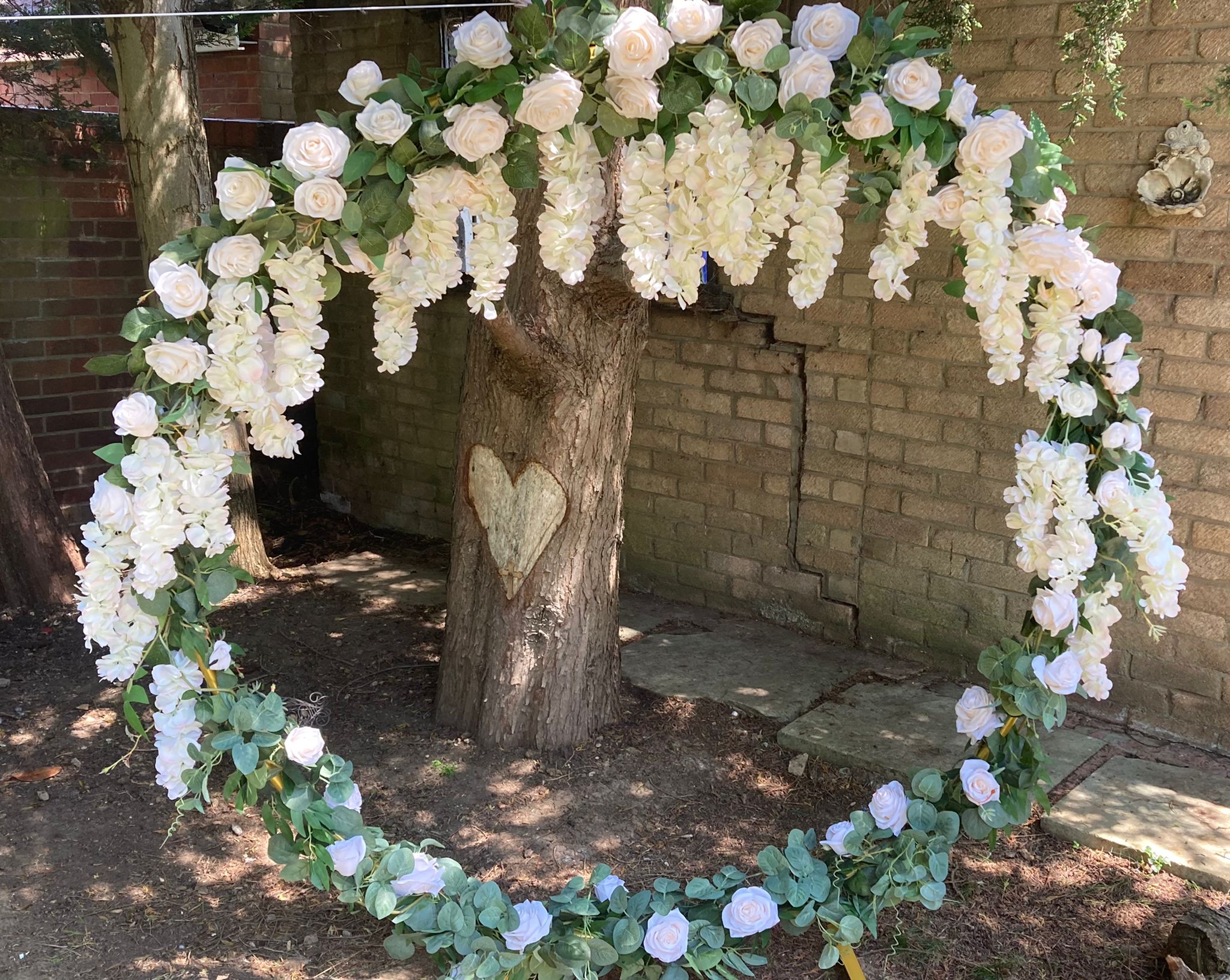 White floral moon door for winter wonderland wedding