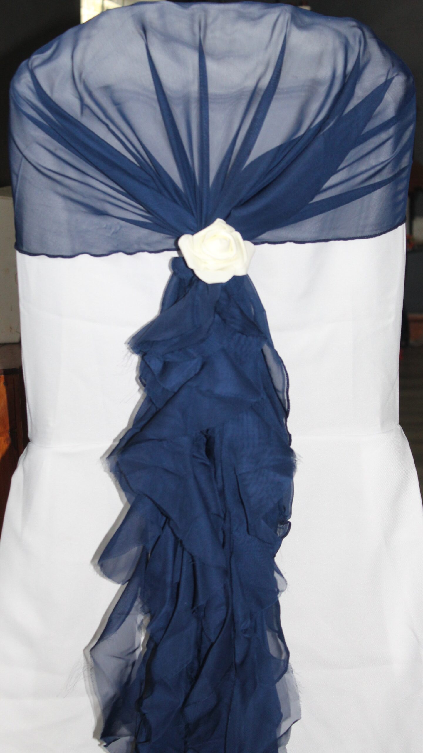 Blue chiffon chair hood with ruffle
