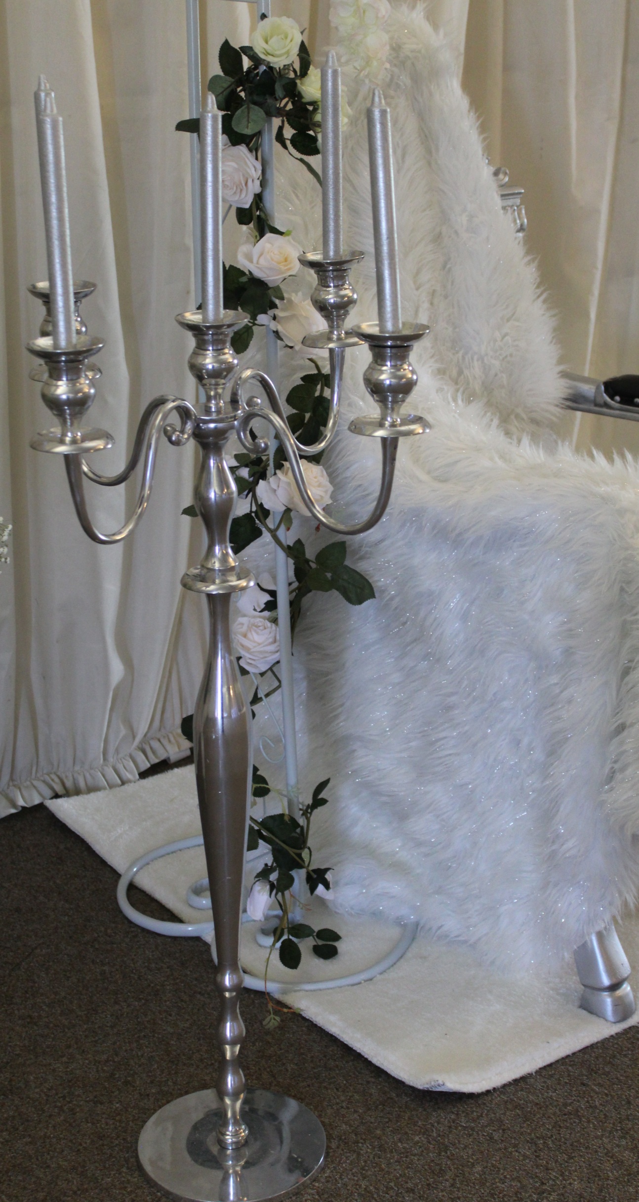 Large silver candlestick for winter wonderland wedding with white candles